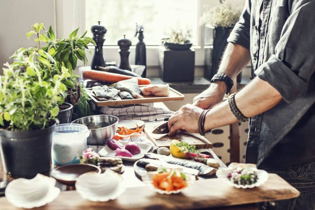 Man in Calgary preparing a Eye Health Meal Plan from NutriPOM's Holistic Nutrition Programs.